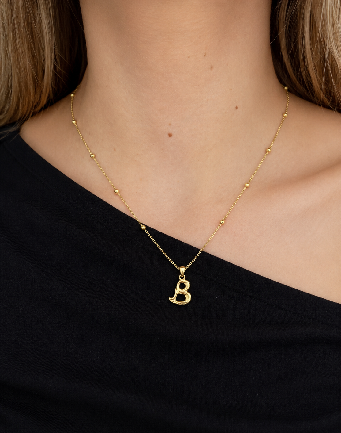 Collar inicial plata bañado en oro
