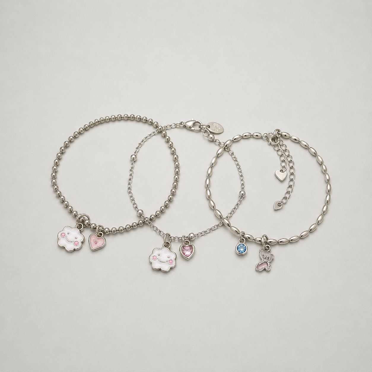 Pulsera nube, flor y mariposa plata