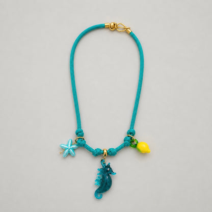 Collar caballito de mar con charms