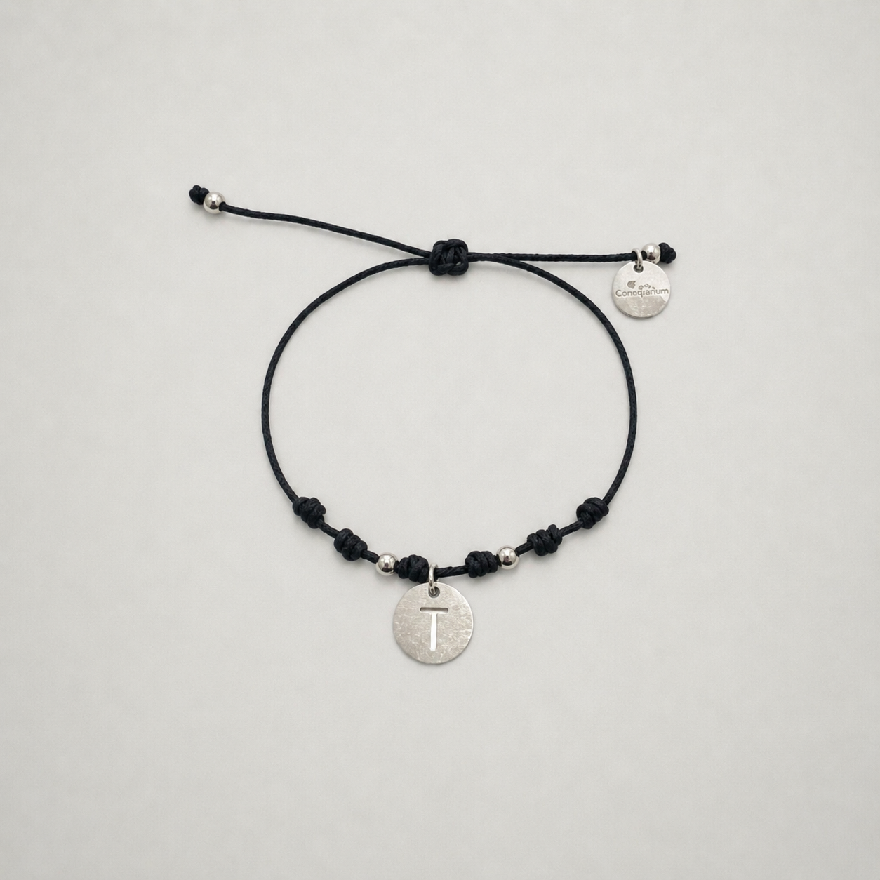 Pulsera inicial plateada