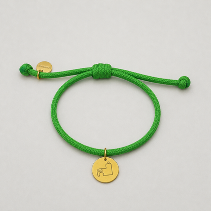 Pulsera chapita grabada Ermita Magdalena con cuerda de paracaídas