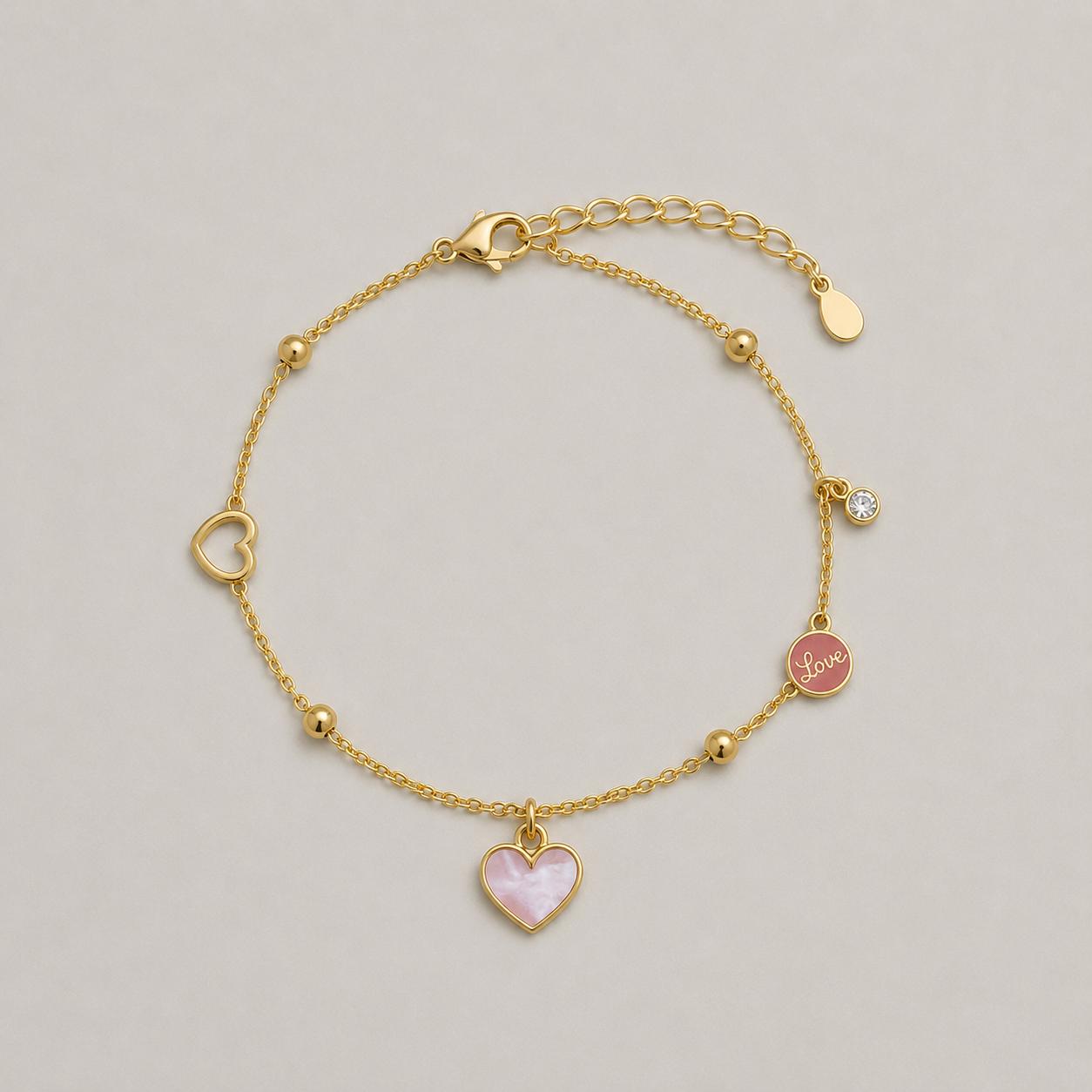 Pulsera plata corazón bañada en oro