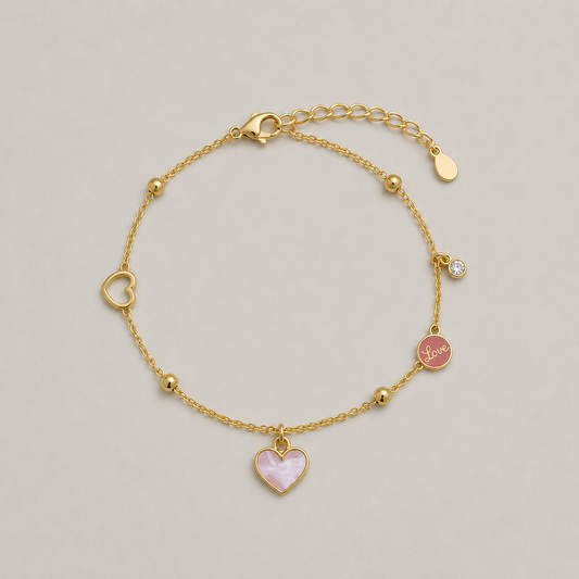 Pulsera plata corazón bañada en oro