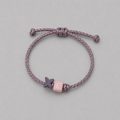 Pack 5 Pulseras letrita con mariposa plata